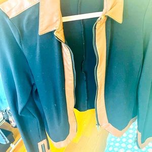 Black jacket with brown sequence.